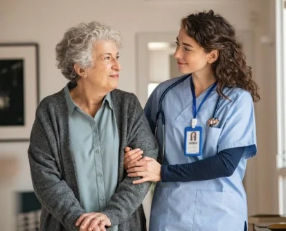 Healthcare professional with patient showing patient care